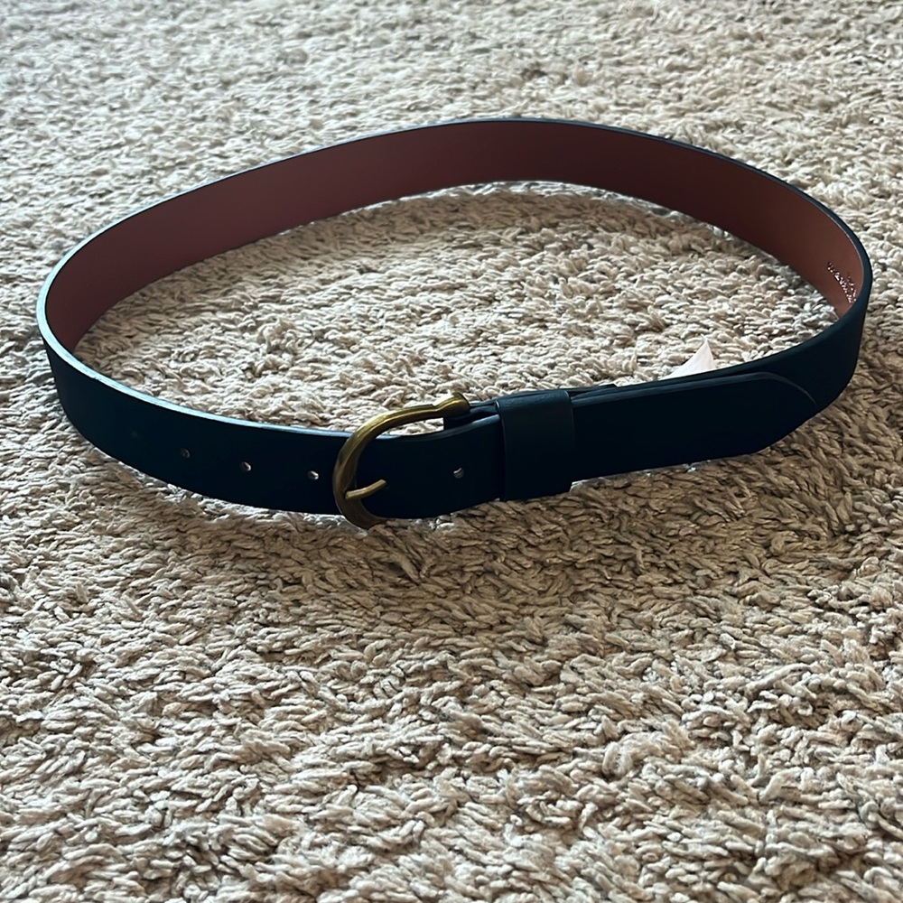 Black leather belt with gold buckle